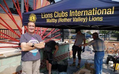 Lions gazebo shelters Maltby Miners Memorial volunteers from the heat